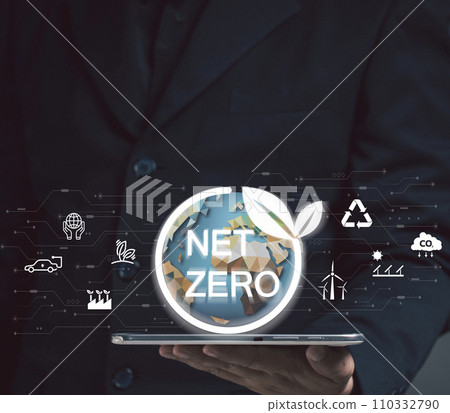 net zero emissions and Carbon neutrality concept. sustainable and clean tech. global warming. Environmental protection, climate eco energy. Man hold tablet show net zero icon. renewable pure power. 110332790