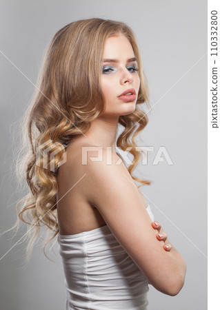 Charming blonde model woman with perfect hairstyle, fresh clear skin and makeup Charming blonde model woman with perfect hairstyle, fresh clear skin and makeup 110332800