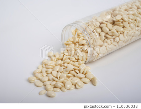 spa wax for depilation in granular form on the white background 110336038