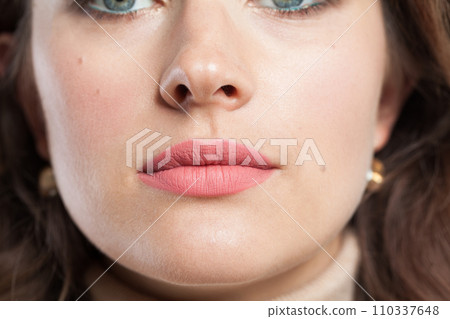 Lips with pink matte lipstick closeup beauty portrait Lips with pink matte lipstick closeup beauty portrait 110337648