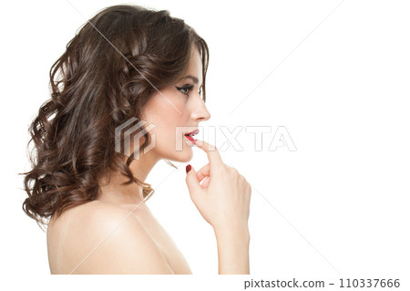 Profile of cute woman brunette with makeup and shiny wavy brown hair isolated on white background 110337666