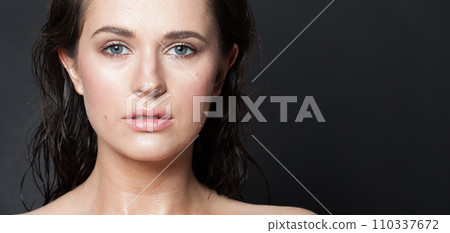 Young fashion beauty model brunette with clear skin and dark hair.  110337672