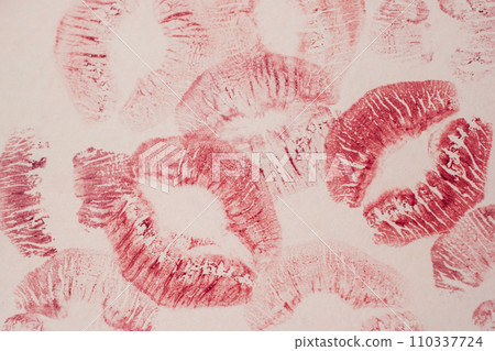 Lipstick imprints on white paper, closeup of photo 110337724