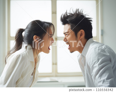 Men and women fighting 110338342