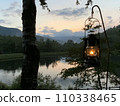 oil lantern and sunset 110338465