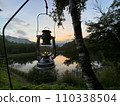 oil lantern and sunset 110338504