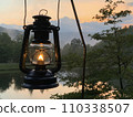 oil lantern and sunset 110338507