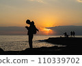 People enjoying their time while watching the sunset 110339702