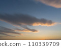 Clouds illuminated by the sunset 110339709