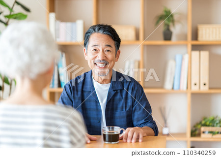 A senior couple chatting. 110340259