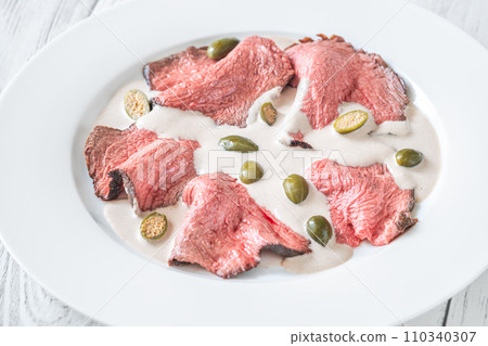 Portion of Vitello tonnato 110340307