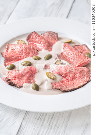 Portion of Vitello tonnato 110340308