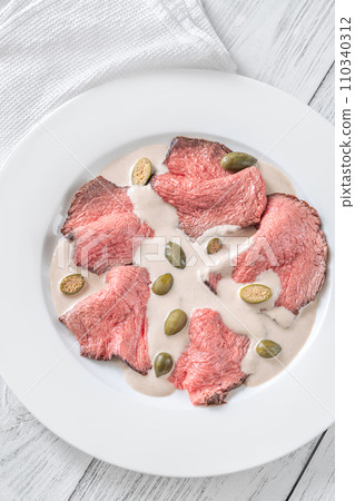 Portion of Vitello tonnato 110340312
