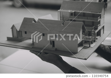 Construction and structure concept of Engineer or architect meeting for project working with partner and engineering tools on model building and blueprint in working site, contract for both companies. Construction and structure concept of Engineer or architect meeting for project working with partner and engineering tools on model building and blueprint in working site, contract for both companies. 110340754