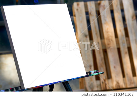 Artist's easel stands for painting pictures on old industrial background Artist's easel stands for painting pictures on old industrial background 110341102