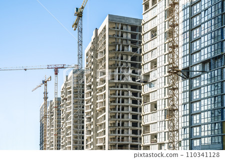 Construction Building site banner background. Construction crane with new apartment skyscraper building. Building industry technology, business, urban concept Construction Building site banner background. Construction crane with new apartment skyscraper building. Building industry technology, business, urban concept 110341128