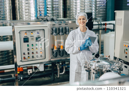 portrait happy women staff worker in drinking water plant work control water quality purification test process. portrait happy women staff worker in drinking water plant work control water quality purification test process. 110341321