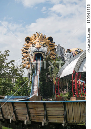 Lion head on top building of log flume at Siam park city, bangkok Lion head on top building of log flume at Siam park city, bangkok 110341516