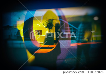 Reflection of Street in Window in the Evening. Abstract Blurred Urban Background. 110342076