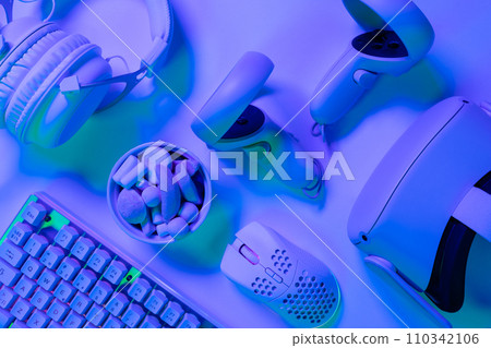 Keyboard with marshmallows and accessories on desk Keyboard with marshmallows and accessories on desk 110342106