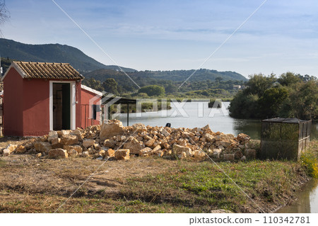 Red house beside a lake 110342781