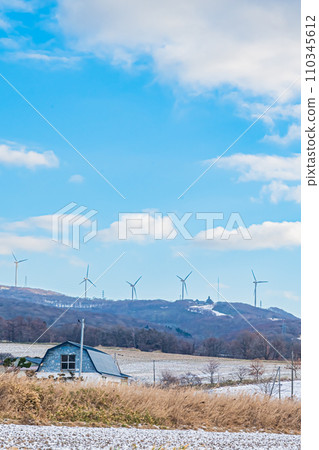 Hokkaido winter scenery with windmills 110345612