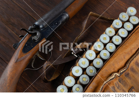 Antique 12 gauge break action smooth bored double barreled side shotgun with cases. 110345766