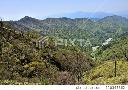 A mountain area with fresh greenery from Mt. Tanzawa in the Tanzawa Mountains. A mountain area with fresh greenery from Mt. Tanzawa in the Tanzawa Mountains. 110345862