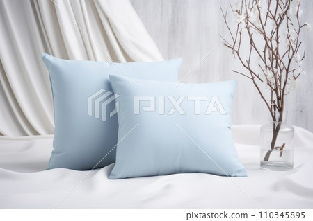 Square canvas pillow mockup on grey sofa, small cotton cushion mockup in living room interior 110345895