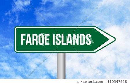 Faroe islands road sign on blue sky background 110347238