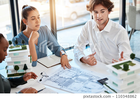 Team, architect engineer and planning building 3d model in meeting with logistics, diversity and teamwork for real estate. Business people working with architecture, construction and house design. 110348862