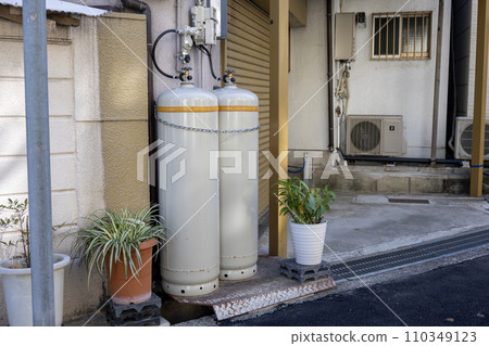 Propane gas LPG cylinder installed outdoors 110349123