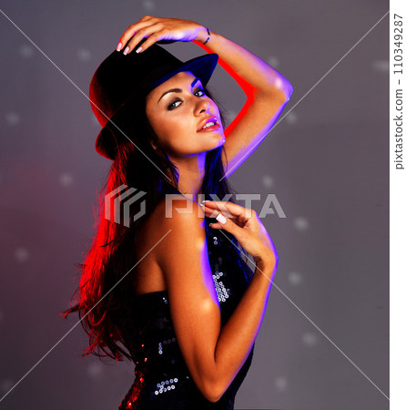 Fashion, beauty and party of a sexy woman with fashionable style in attractive pose for a disco, concert or event. Portrait of a beautiful young female ready for a club night, DJ music or house fun. 110349287