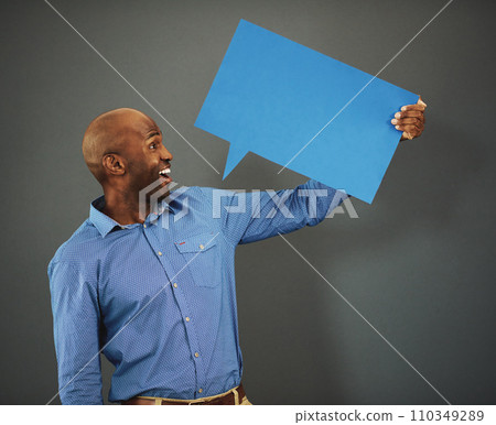 Review, communication and speech bubble with business man marketing, holding and advertising his message on a blank board. Poster, billboard and mock up with empty message board with copy space. Review, communication and speech bubble with business man marketing, holding and advertising his message on a blank board. Poster, billboard and mock up with empty message board with copy space. 110349289
