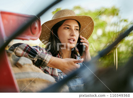 Sustainability farmer, worker and woman on a phone talking and planning a plant growth strategy. Sustainable, eco friendly farm hand on a work call about farming, agriculture and countryside project 110349368