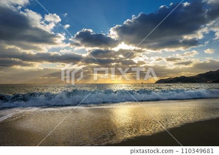 Sunset on the beach 110349681