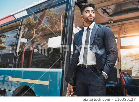 Corporate businessman travel in a city on a bus to work in a suit thinking of goals and professional career. Confident, young and Indian worker or startup entrepreneur on daily urban commute 110350127