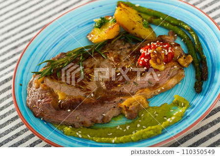 Veal with grilled vegetables Veal with grilled vegetables 110350549