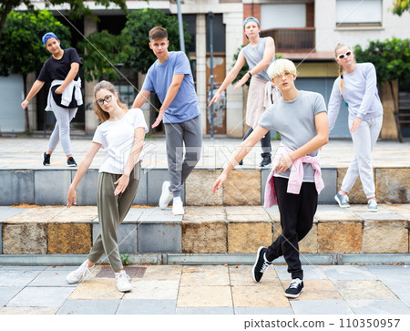Portrait of group of teenagers at street. Hip hop dancers Portrait of group of teenagers at street. Hip hop dancers 110350957