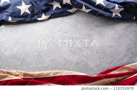 Happy Presidents day concept made from American flag and the text on dark stone background. Happy Presidents day concept made from American flag and the text on dark stone background. 110350970