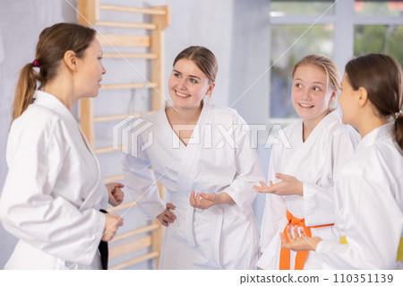 Group of girls in kimono chatting 110351139