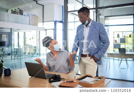 Confused businesswoman with covid face mask asking colleague to cover his face while showing wtf, what and why hand gesture in office. Concerned coworker looking annoyed during quarantine work policy 110352018