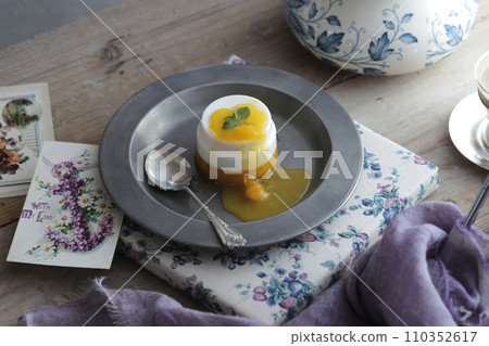 panna cotta with orange sauce 110352617