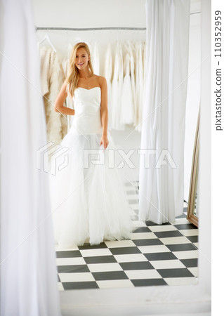 Wedding, dress and portrait of young bride in a luxury boutique, shop or store in a mall. Retail, style and female person from Canada preparing for marriage ceremony, party or reception for love. Wedding, dress and portrait of young bride in a luxury boutique, shop or store in a mall. Retail, style and female person from Canada preparing for marriage ceremony, party or reception for love. 110352959