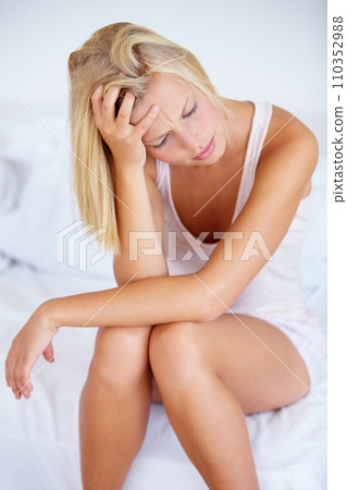 Woman, stress and headache in home bedroom for depression, anxiety and burnout worry. Morning, frustrated and tired person in house for mental health, migraine and pain from crisis, mistake and fail 110352988