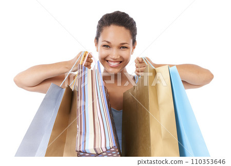 Happy woman, portrait and shopping bag for discount, sale and retail giveaway in commerce on a white background. Fashion winner, customer or excited african person with gift or winning deal in studio 110353646