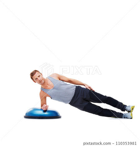 Man, fitness and balance on bosu ball for core training, muscle and workout isolated on white background. Exercise equipment, strength and endurance with mockup space and strong athlete in studio Man, fitness and balance on bosu ball for core training, muscle and workout isolated on white background. Exercise equipment, strength and endurance with mockup space and strong athlete in studio 110353981