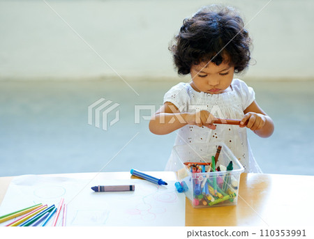 Young girl, crayons and drawing in classroom for creative development, education growth in kindergarten. Child, daycare or table pencils artwork for learning play school or paper, craft idea or color Young girl, crayons and drawing in classroom for creative development, education growth in kindergarten. Child, daycare or table pencils artwork for learning play school or paper, craft idea or color 110353991