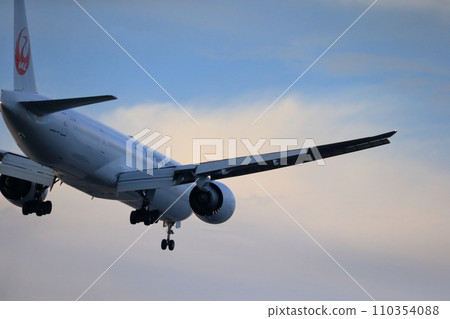Passenger plane taking off and landing image 110354088