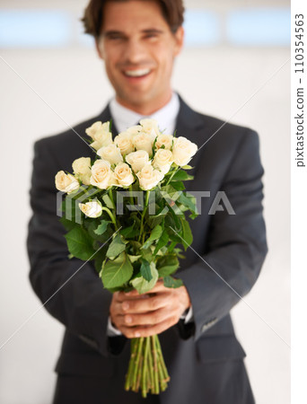 Gift, portrait and happy man with flowers for love, giving or valentines day celebration on wall background. Face, roses and person with bouquet for anniversary, romance or congratulations gesture Gift, portrait and happy man with flowers for love, giving or valentines day celebration on wall background. Face, roses and person with bouquet for anniversary, romance or congratulations gesture 110354563